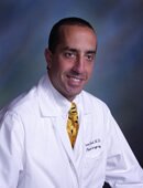 Dr. Tom Pousti